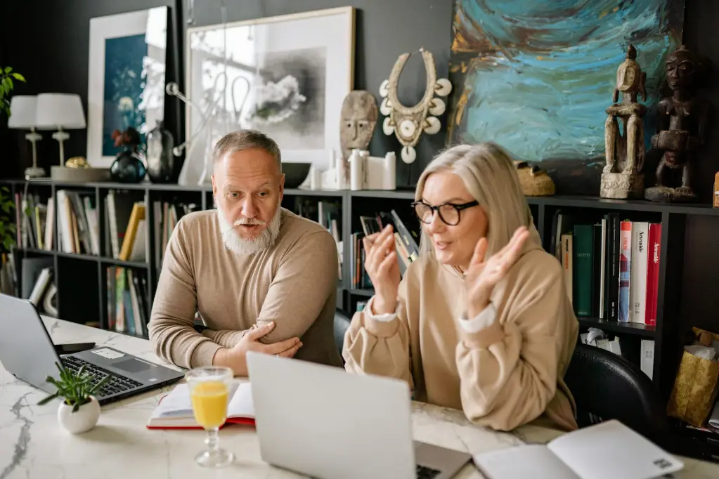 man and woman sitting at the table