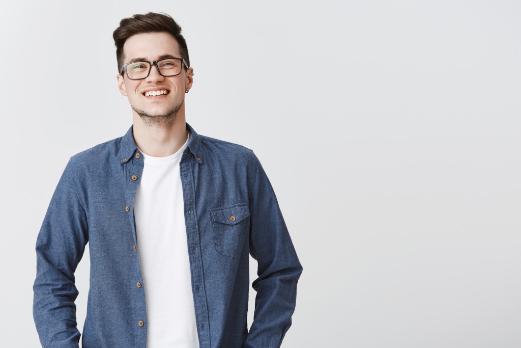 enthusiastic smiling man looking happy glasses casual clothes